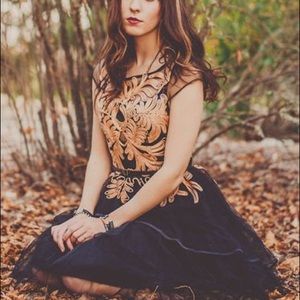 Black and gold tulle cocktail dress